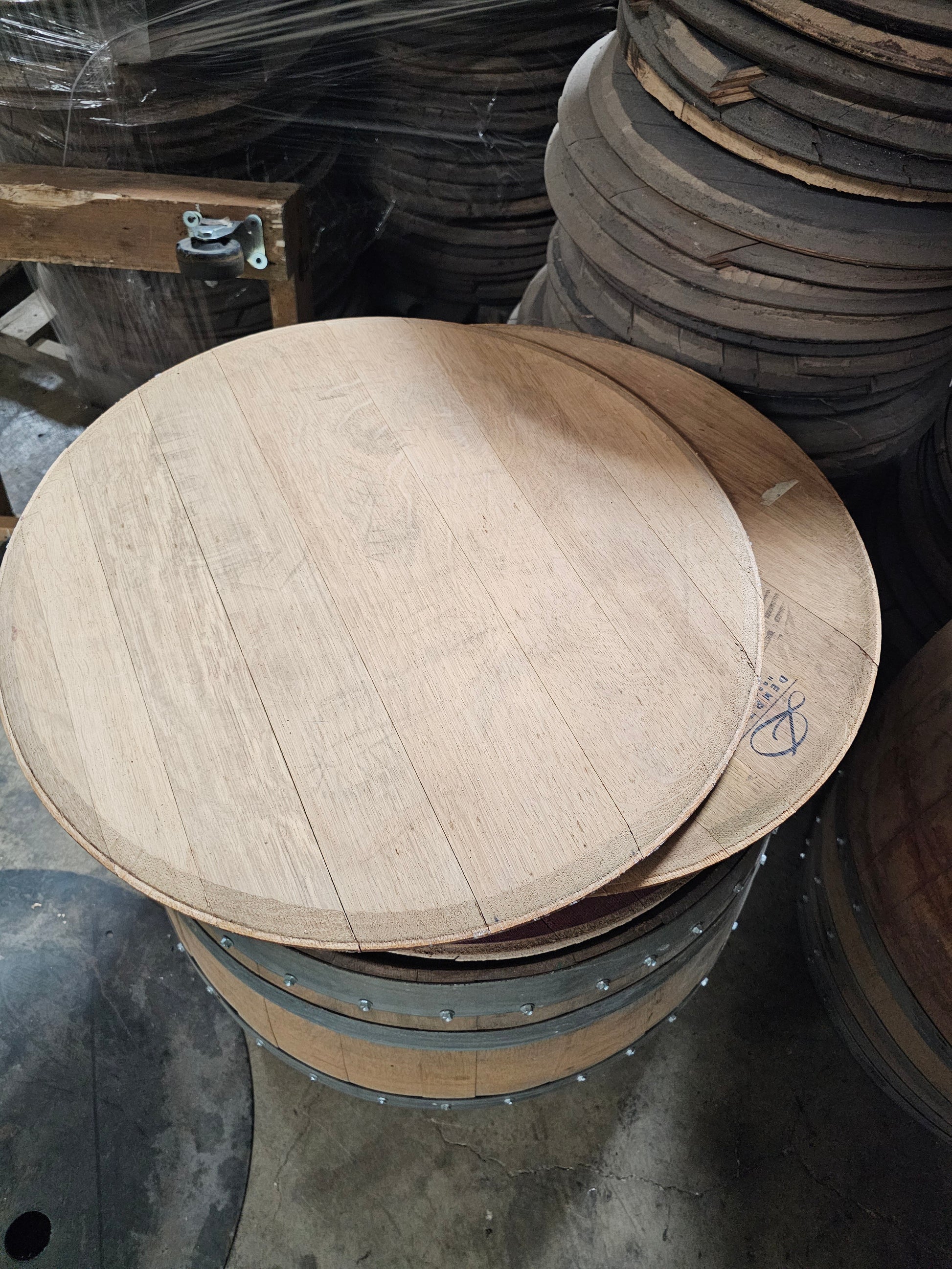 stack of wine barrel heads