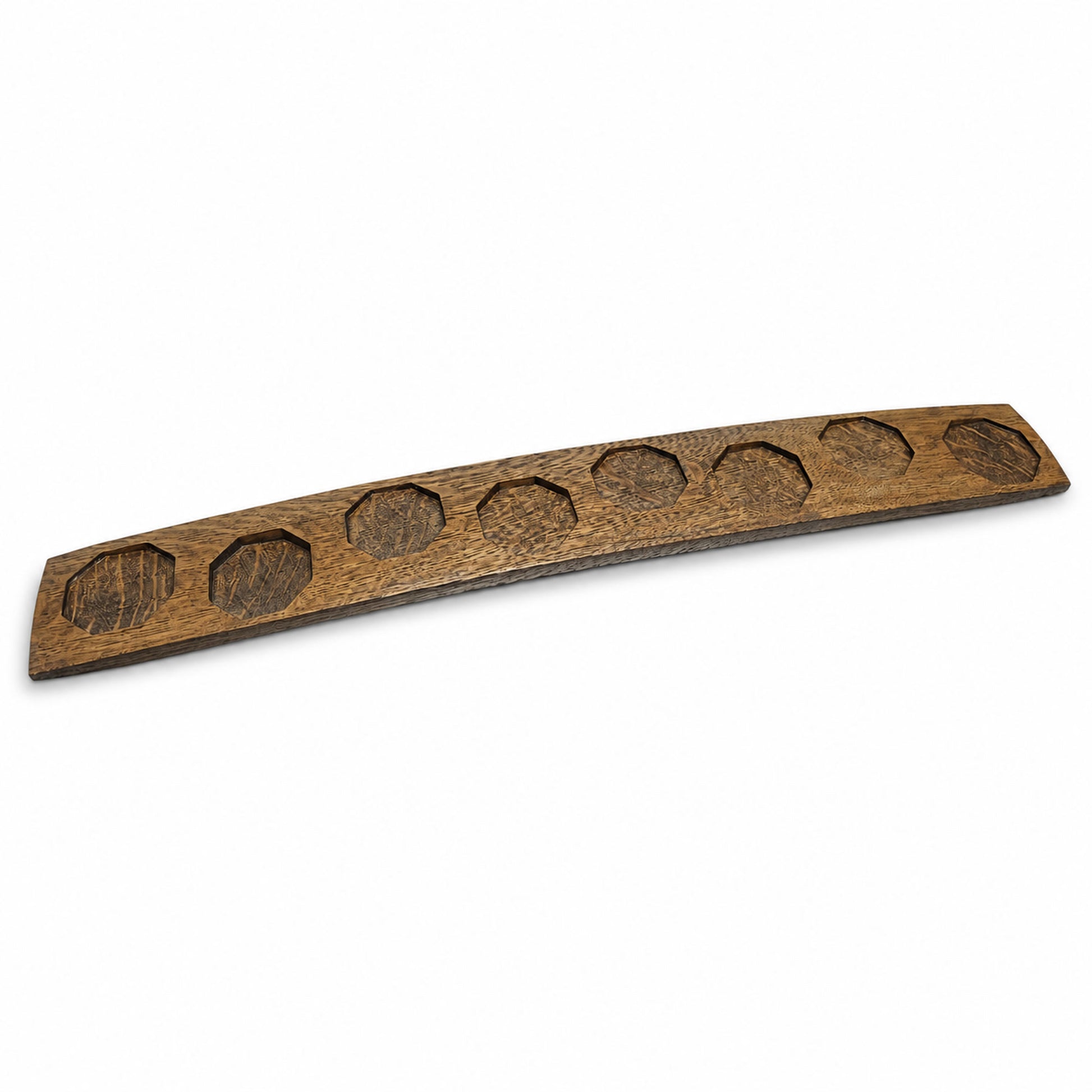 Dark walnut reclaimed oak bourbon barrel stave with eight routed bottle recesses.