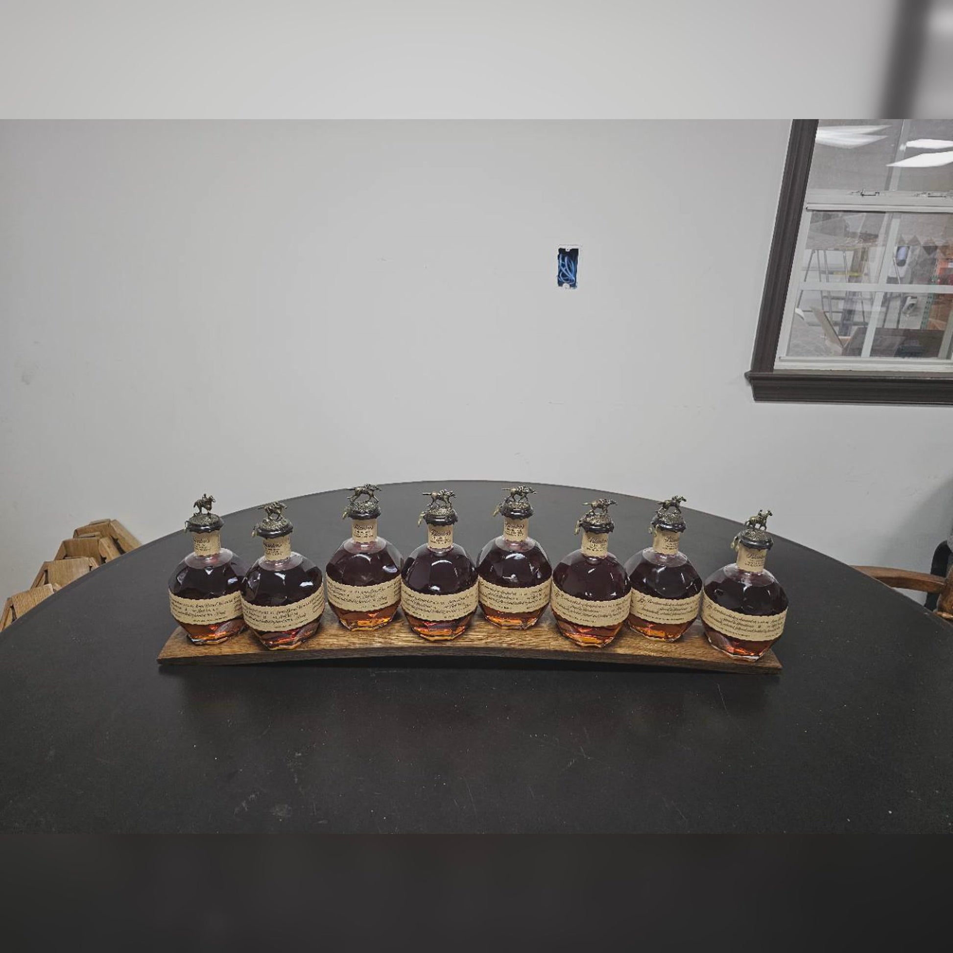 Front view of the eight-bottle bourbon collection display; bottles not included.