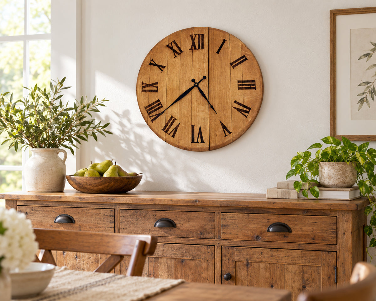 Barrel head wall clock displayed above a sideboard in a kitchen breakfast nook