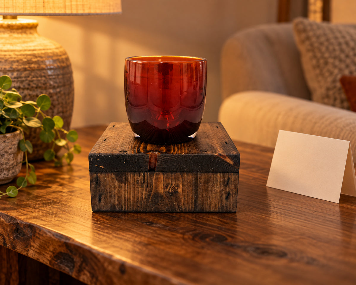 Single Glassybaby Candle Display Stand – Reclaimed Wood Pedestal in housewarming display.