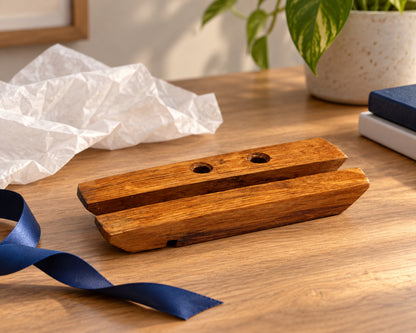 Wine barrel wood card and pen holder displayed with tissue and ribbon for a new-job gift; wrapping is styling only