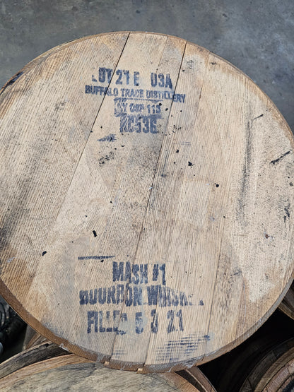 Authentic Buffalo Trace bourbon barrel head with black distillery stamp; raw and unfinished.