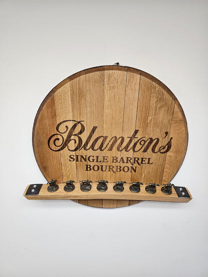 Wide front view of the handcrafted Blanton's barrel head stopper display; all horse stoppers are display props and are not included.