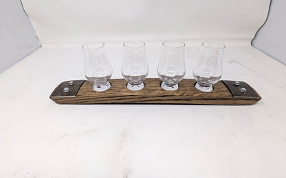 Mini premium four-glass whiskey flight with Wee Glencairn glasses on reclaimed barrel stave